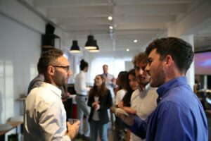 Group of people networking at an event.Talking with each other.